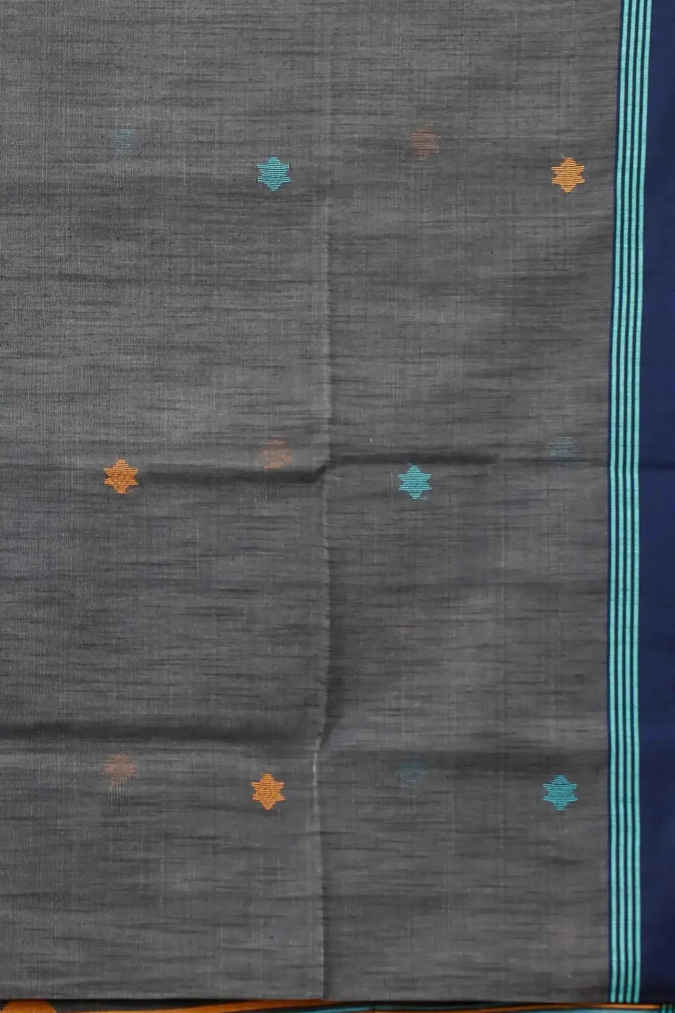 Elegant Black & Green Manipuri Cotton Saree With Blue & Mustard Woven Border