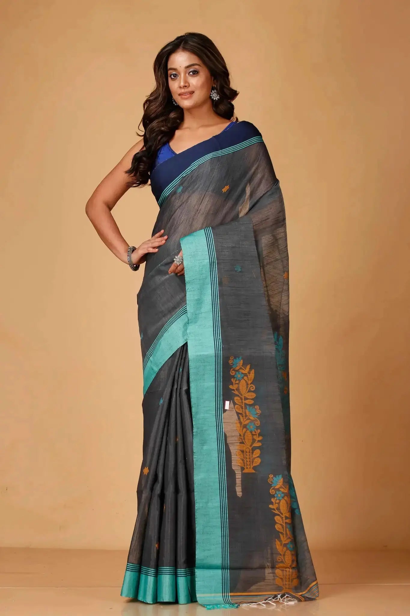 Elegant Black & Green Manipuri Cotton Saree With Blue & Mustard Woven Border