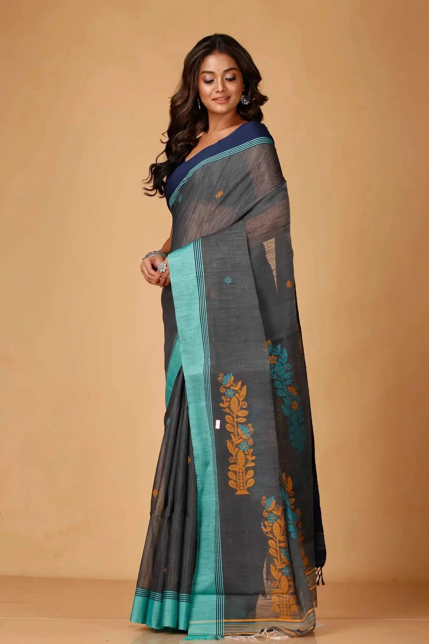 Elegant Black & Green Manipuri Cotton Saree With Blue & Mustard Woven Border