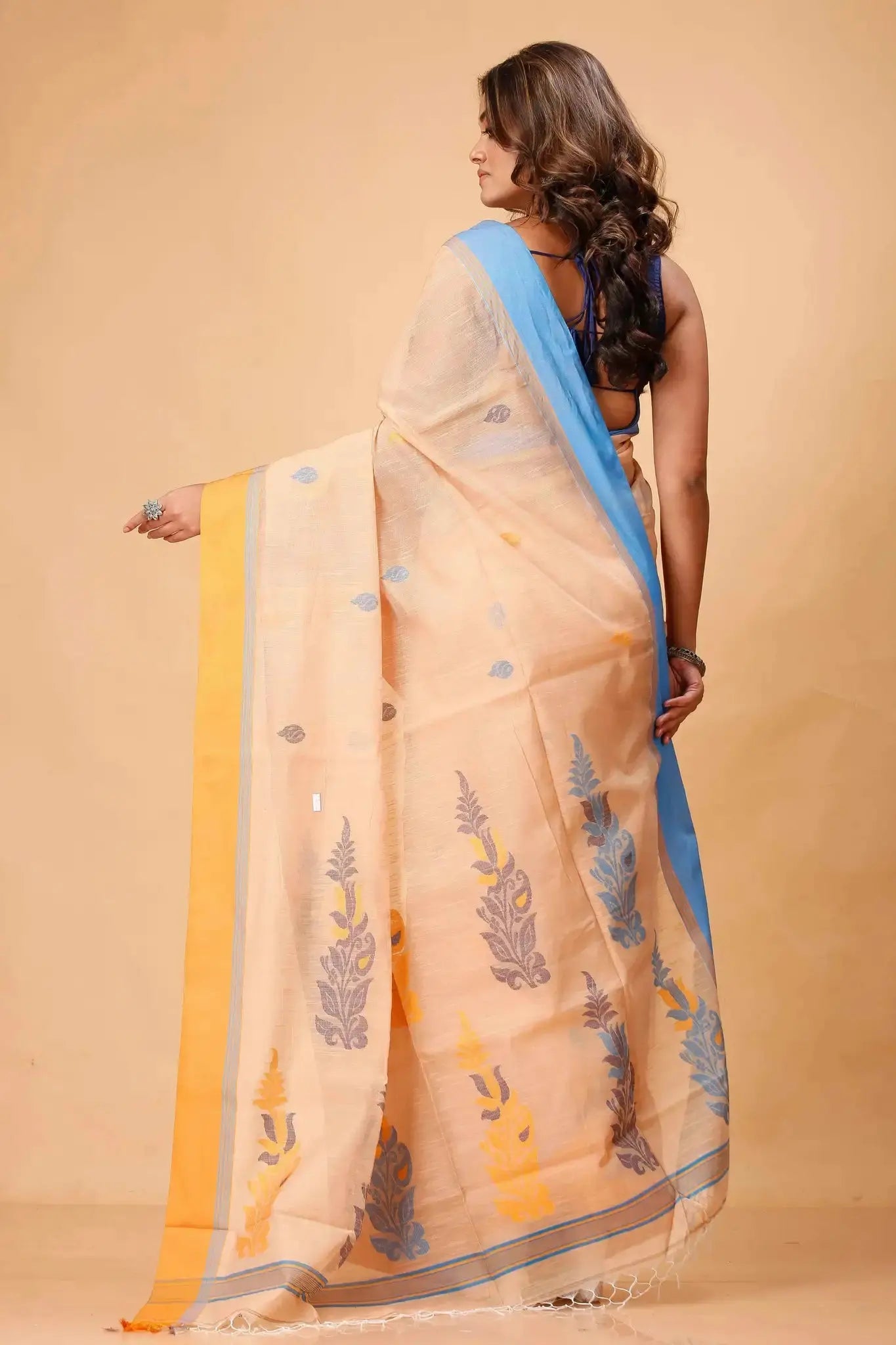 Peach Beige Manipuri Cotton Saree with Mustard Yellow Border & Blue Floral Woven Motifs