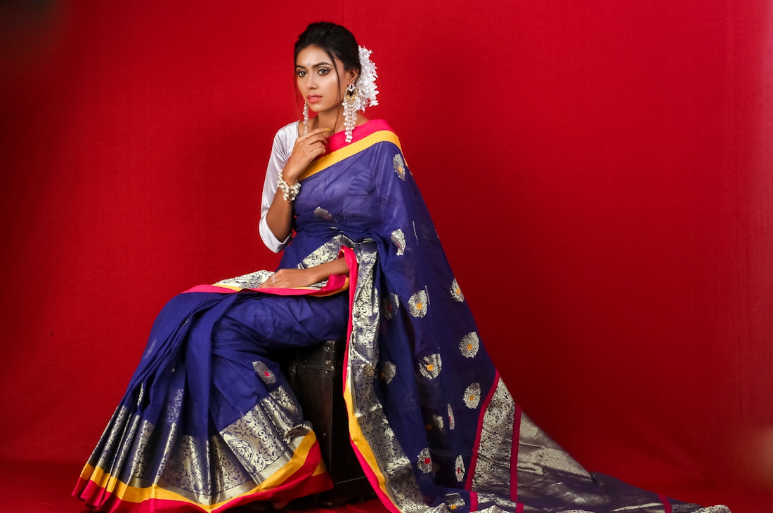 woman in blue and yellow sari dress