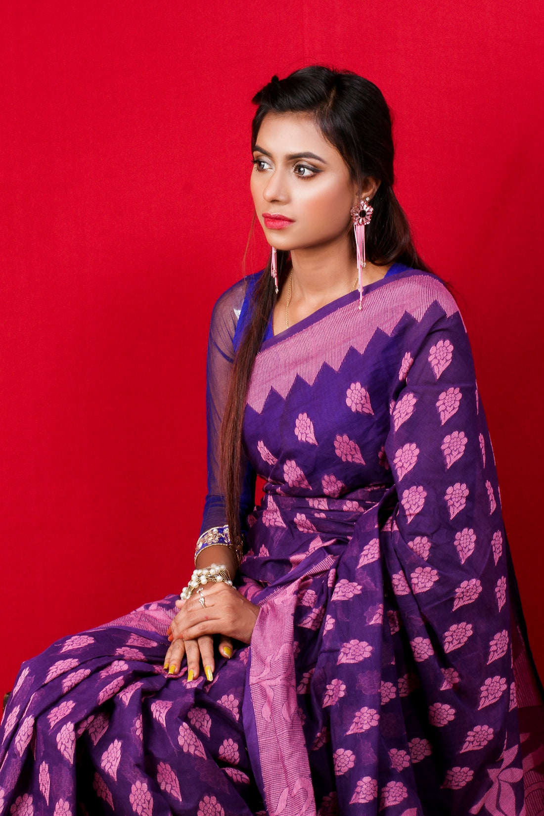 woman in blue and white floral robe