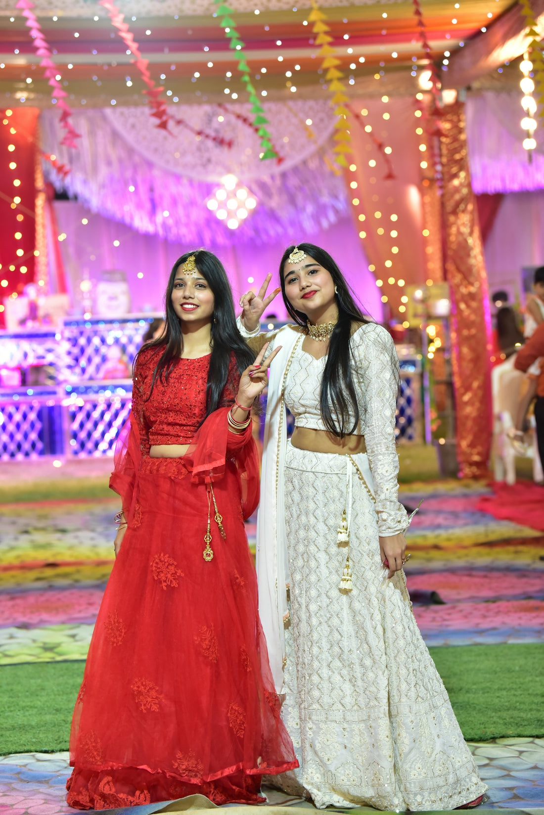 a couple of women standing next to each other