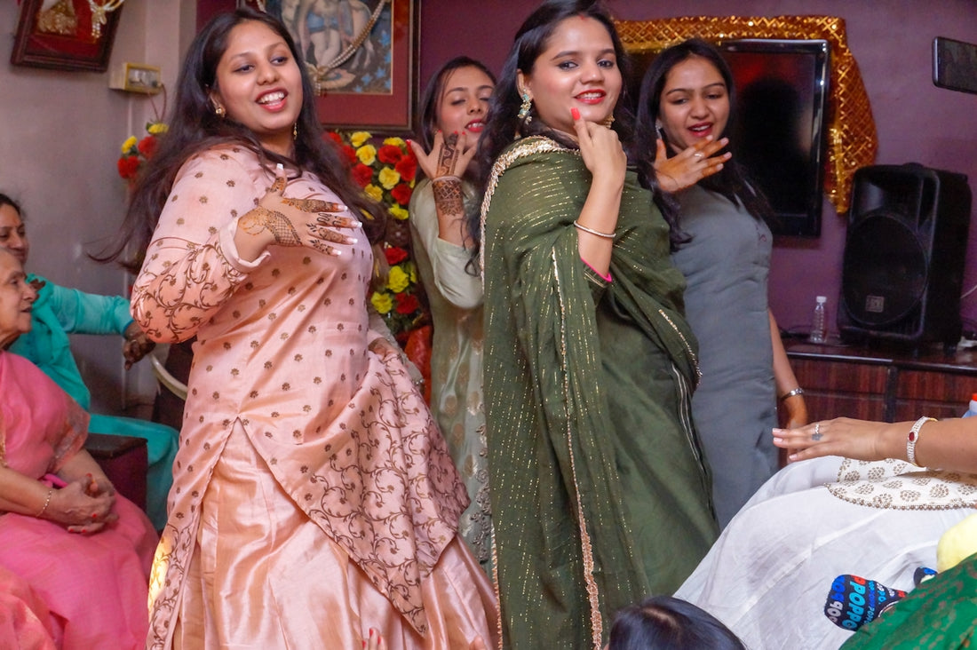 a group of women standing next to each other