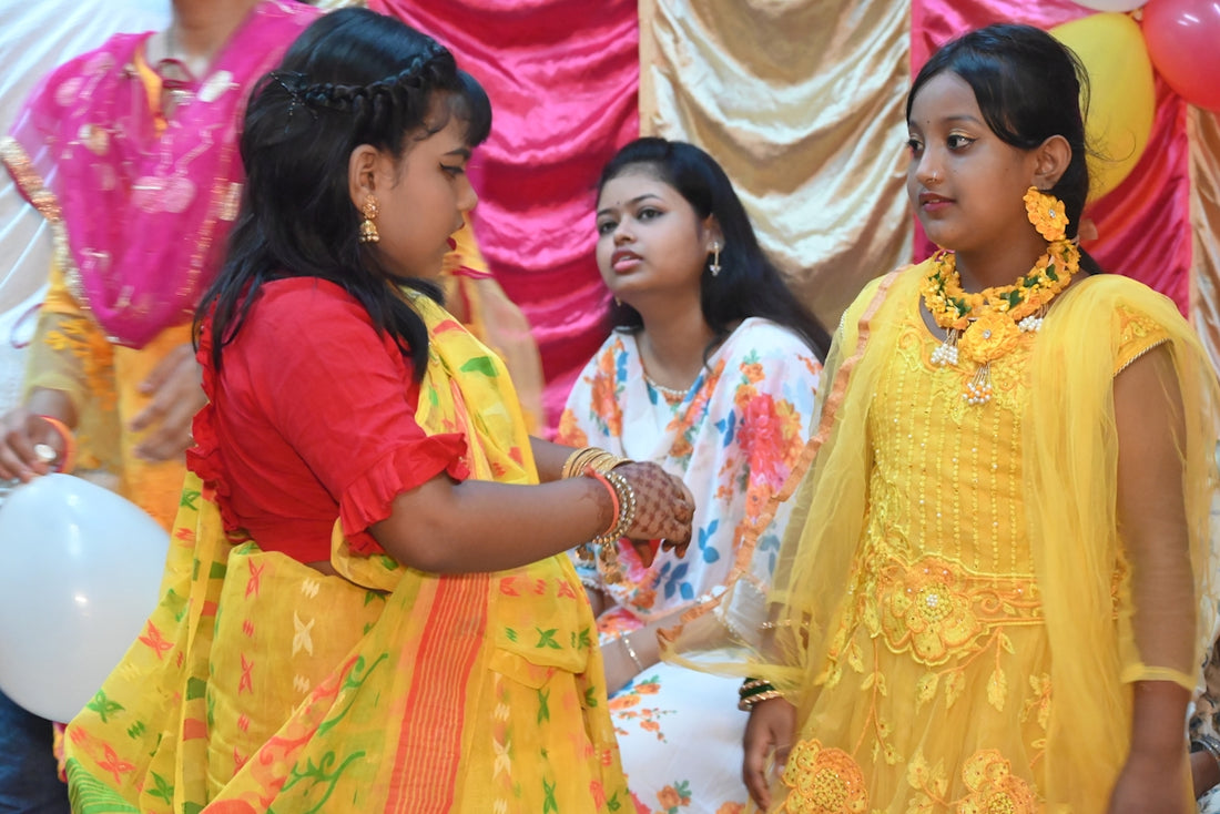 A group of women standing next to each other