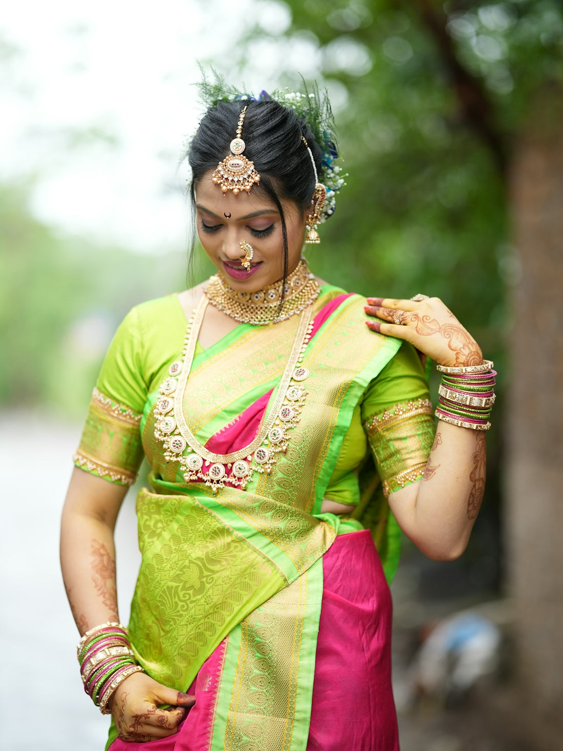 A beautiful bride poses in her wedding attire.