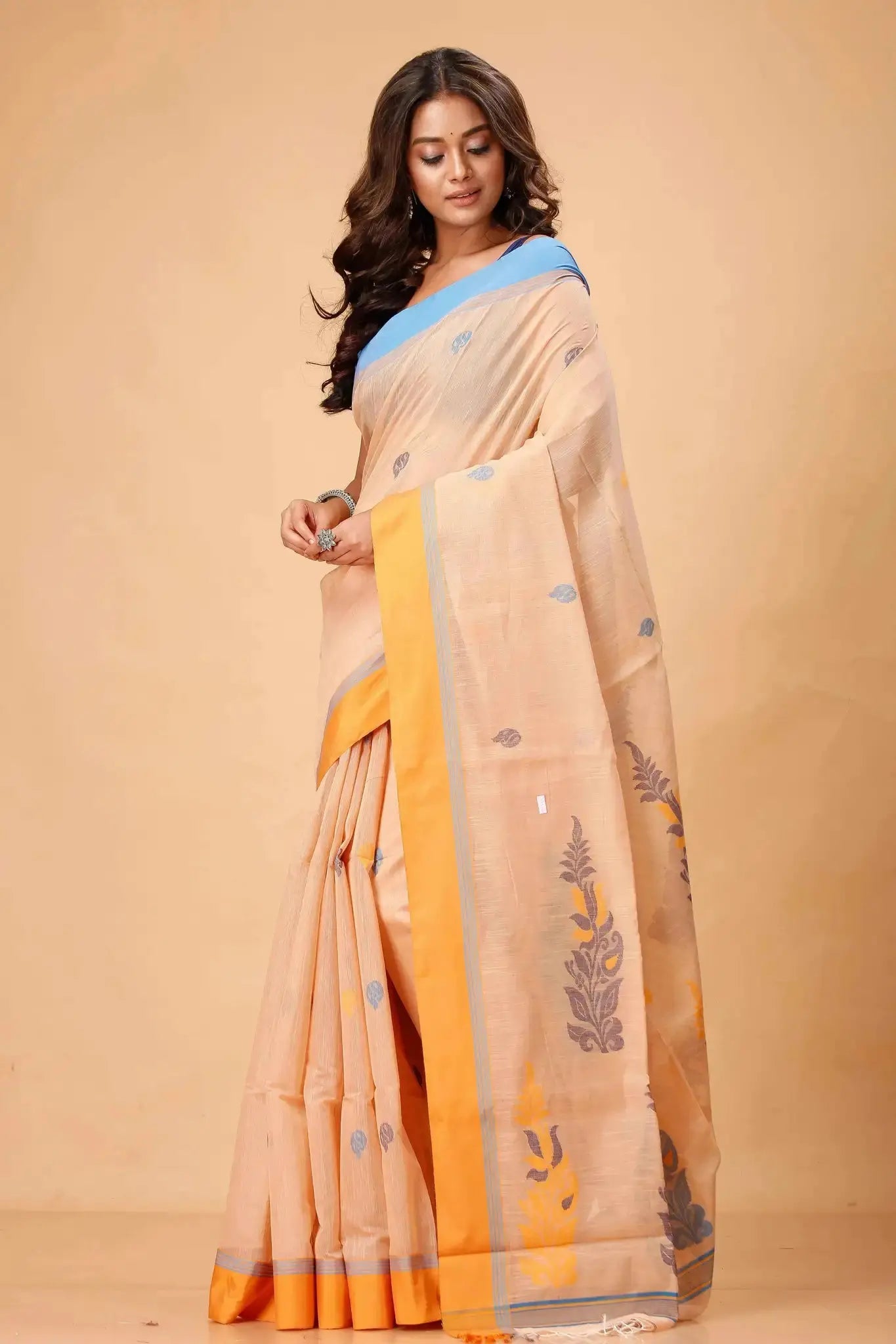 Peach Beige Manipuri Cotton Saree with Mustard Yellow Border & Blue Floral Woven Motifs